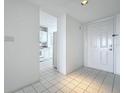 Condo entryway with tiled floors and kitchen peek at 4410 Fairways Blvd Blvd # 607, Bradenton, FL 34209