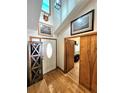 Bright entryway with high ceilings and hardwood flooring at 26240 Willow St, Brooksville, FL 34601