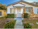 Charming house with stone accents and well-manicured landscaping at 1318 Preston S St, St Petersburg, FL 33712