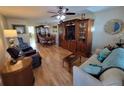 Living room with hardwood floors, furniture, and a dining area at 4895 Bay Ne St # 215, St Petersburg, FL 33703