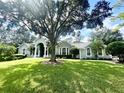 Spacious home nestled amongst beautiful landscaping at 168 Rue Des Chateaux, Tarpon Springs, FL 34688