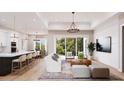 Spacious living room with open floor plan and access to backyard at 0 Dusky Warbler Rd, Weeki Wachee, FL 34614