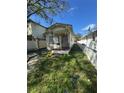 Quaint bungalow-style home with small yard at 411 S Orleans Ave, Tampa, FL 33606