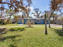 Charming single story home with a spacious yard at 381 E Langsner St, Englewood, FL 34223