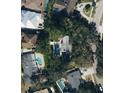 Bird's-eye view of a home with a pool in a residential neighborhood at 2615 S Hawthorne Cir, Tampa, FL 33629