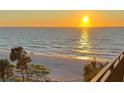 Beautiful beach view with golden sunset at 2618 Gulf Blvd # 407, Indian Rocks Beach, FL 33785