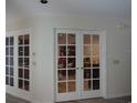 Interior view of French doors leading to another room at 13936 Clubhouse Cir # 13936, Tampa, FL 33618