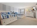 Two twin beds with white frame in a spacious bedroom at 19725 Gulf Blvd # 20, Indian Shores, FL 33785