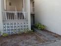 Apartment building entrance with stairs and a walkway at 2625 State Road 590 # 2412, Clearwater, FL 33759