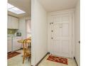 Bright condo entryway with kitchen and dining area visible at 12760 Indian Rocks Rd # 1071, Largo, FL 33774