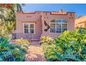 Spanish-style home with brick walkway and lush landscaping at 114 19Th Ne Ave, St Petersburg, FL 33704