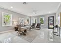 Bright living room features neutral colors, plush seating, and ample natural light at 2921 Sanchez St, Tampa, FL 33605