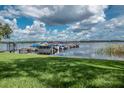 Full boat dock with many boats and access to the lake at 90 S Highland Ave # 1115, Tarpon Springs, FL 34689