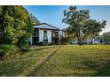 Condo building nestled in a lush, grassy area at 3455 Countryside Blvd # 52, Clearwater, FL 33761
