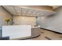 Modern building lobby with contemporary reception desk at 1120 E Kennedy Blvd # 1024, Tampa, FL 33602