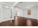 Spacious living room featuring hardwood floors and a ceiling fan at 20213 Autumn Fern Ave, Tampa, FL 33647