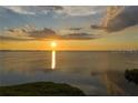 Scenic sunset over calm ocean water at 611 Maryland Ave, Crystal Beach, FL 34681