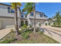 Three-unit townhome building with attached garages at 928 Royal Empress Dr, Ruskin, FL 33570