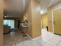 Home entryway with view of the living room and kitchen at 6007 Skydale Way # 201, Riverview, FL 33578