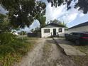 Charming single-story home with a well-maintained front yard and fence at 3102 W Leroy St # A, Tampa, FL 33607