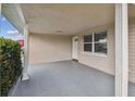 Covered entryway, providing a sheltered entrance to the home at 3525 Umber Rd, Holiday, FL 34691