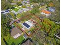 Aerial view of a property with a house and large lot at 2820 W Leila Ave, Tampa, FL 33611