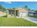 Newly built home with a one car garage at 2010 1/2 E Wood St # St, Tampa, FL 33604