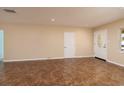 Living room featuring tile floors and neutral-toned walls at 6614 10Th Avenue S Ter, St Petersburg, FL 33707