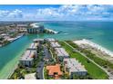 Aerial view of a condo community near the ocean at 7434 Bayshore Dr # 404, Treasure Island, FL 33706