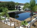 Community boardwalk and dock access to the canal at 2571 Cyprus Dr # 1-202, Palm Harbor, FL 34684