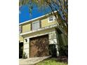 Two-story townhome with attached garage at 8550 Trail Wind Dr, Tampa, FL 33647