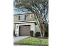 Two-story townhome with attached garage at 8550 Trail Wind Dr, Tampa, FL 33647