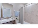 Bathroom with shower/tub combo and granite vanity at 18009 Tavernside Trl, Lakewood Ranch, FL 34211