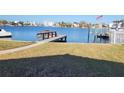 Private dock with water access and city views at 10350 Paradise Blvd, Treasure Island, FL 33706