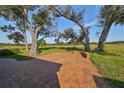 Brick patio overlooking a golf course at 1148 Emerald Hill Way, Valrico, FL 33594