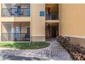 Well-maintained building entrance with stairs and walkway at 4323 Bayside Village Dr # 105, Tampa, FL 33615