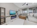Relaxing living room with sectional sofa and fireplace at 6372 Palma Del Mar S Blvd # 320, St Petersburg, FL 33715
