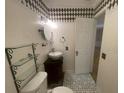 Clean bathroom with updated vanity and toilet at 8221 12Th N Way # E, St Petersburg, FL 33702