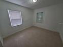 Bright bedroom with tiled floors and neutral walls at 1311 Prescott S St, St Petersburg, FL 33712