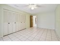 Bright bedroom with tiled floors and built-in closet at 11200 102Nd Ave # 136, Seminole, FL 33778