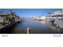 Scenic canal-front view with boats and waterfront homes at 8525 42Nd N Ave, St Petersburg, FL 33709