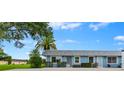 Charming single-story home featuring mature landscaping including a palm tree and neutral paint at 3361 Scorecard Dr # 0, New Port Richey, FL 34655