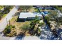 Ranch style house with driveway and yard at 300 Pinellas S Way, St Petersburg, FL 33707
