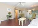 Living room features hardwood floors, tasteful furnishings, and an open floor plan at 315 30Th W Ave # B201, Bradenton, FL 34205