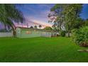 Spacious backyard with lush grass and a patio at 3887 50Th S Ave, St Petersburg, FL 33711