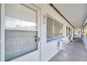 Renovated apartment building showcasing a hallway and individual apartment entrance at 2353 Shelley St # 16, Clearwater, FL 33765