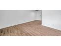 Bright living room with wood-look tile floors at 2353 Shelley St # 16, Clearwater, FL 33765