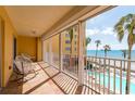 Spacious balcony overlooking the ocean and pool at 16500 Gulf Blvd # 352, North Redington Beach, FL 33708