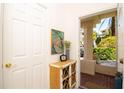 Bright and airy entryway with decorative accents at 4630 Mirabella Ct, St Pete Beach, FL 33706