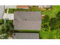 This aerial rooftop view displays the house's shingle roof and the surrounding landscape at 27542 Sky Lake Circle, Wesley Chapel, FL 33544